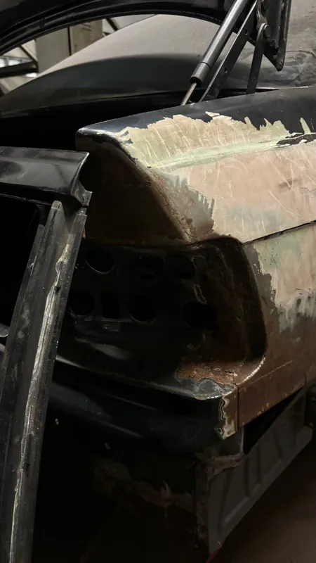 E36 rear quarter with fresh filler, tail light out