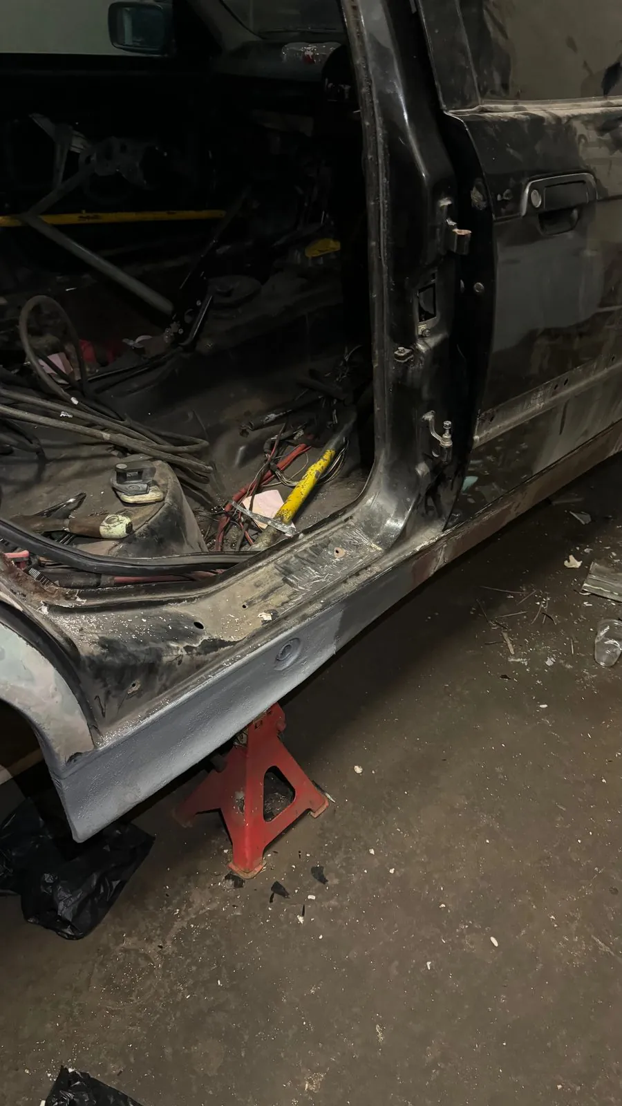 E36 door opening and sill with a new panel welded on, cabin stripped