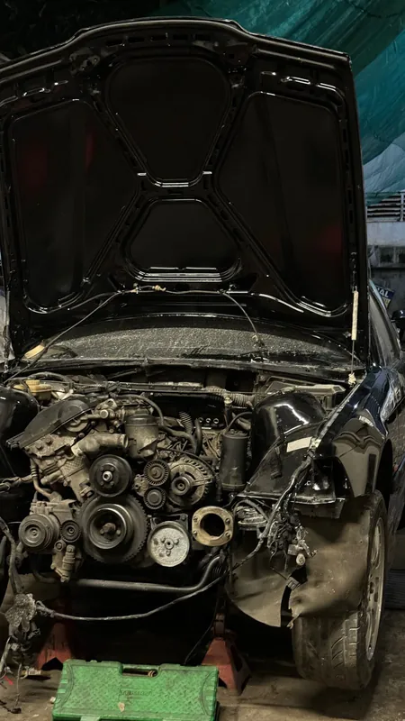 E36 engine bay with the front end removed