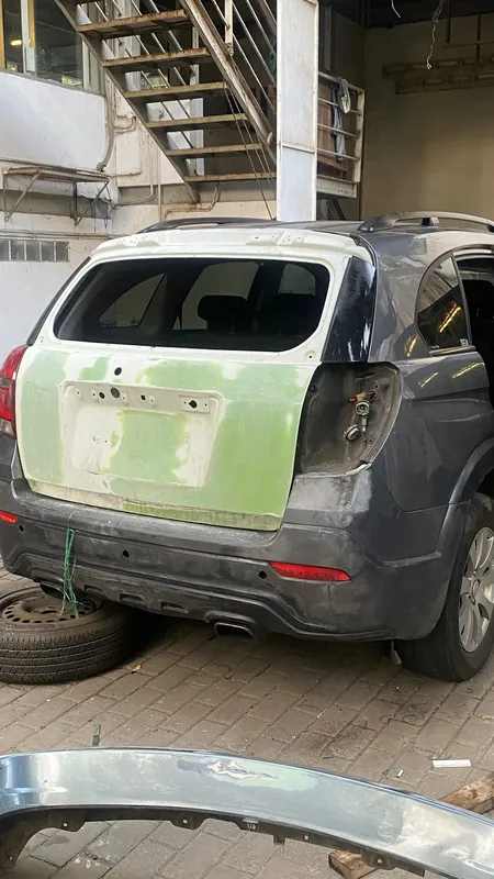 Rear of the Captiva in primer with the bumper removed