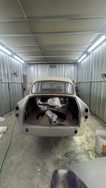 Rear of the Fiat shell in primer with the boot open