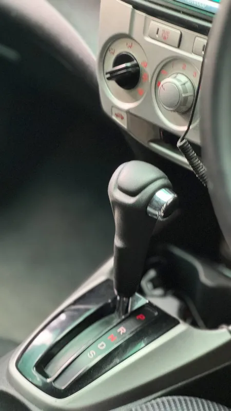 Gear selector and climate dials of the Honda City